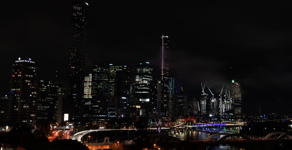 a city skyline with a bridge and a city skyline