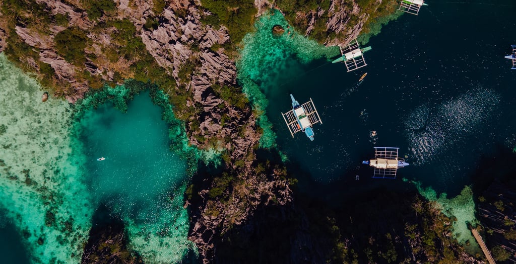 a group of boats floating on a river