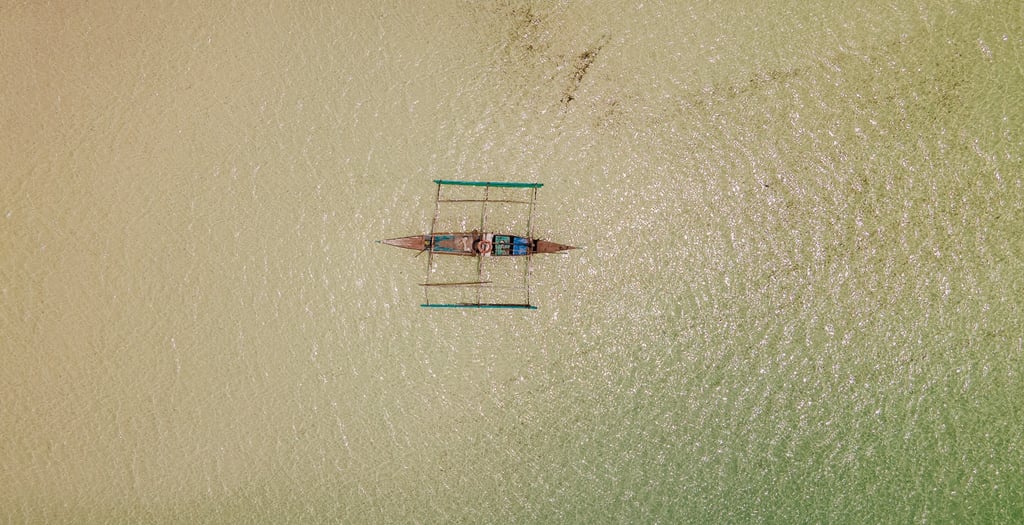 a boat is sitting in the water