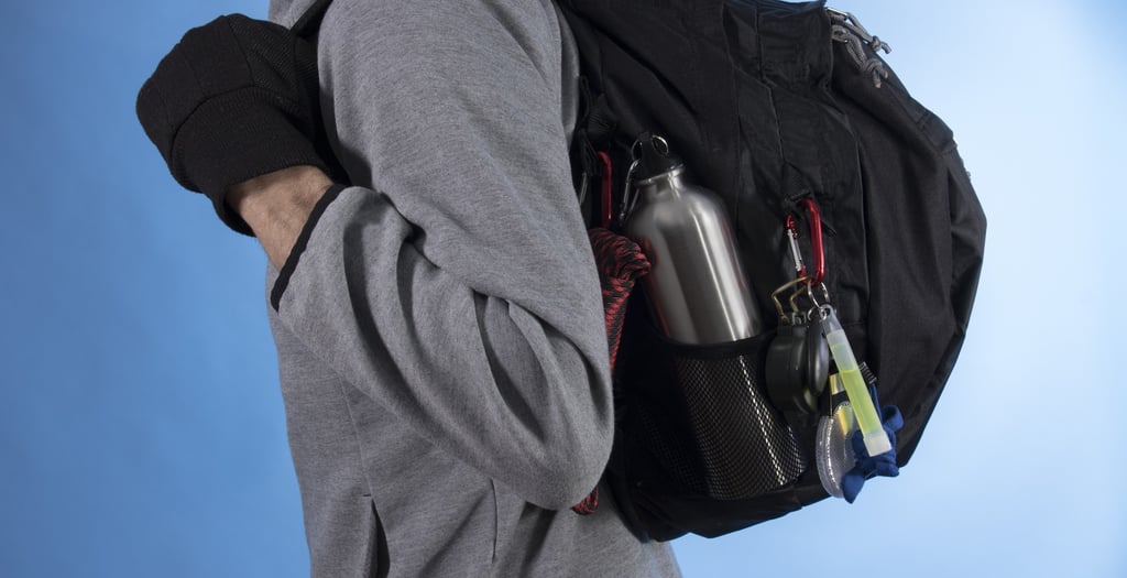 a man with a bugout backpack on his back