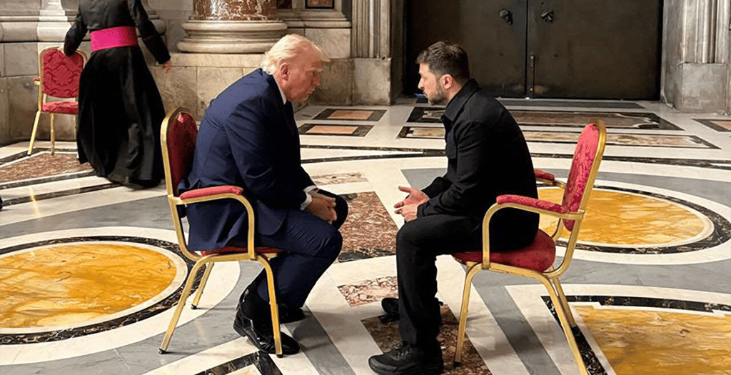 a man in a suit and a priest in a church