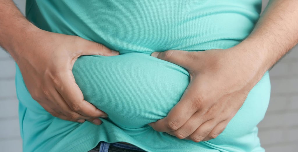 a man with a belly bag on his stomach