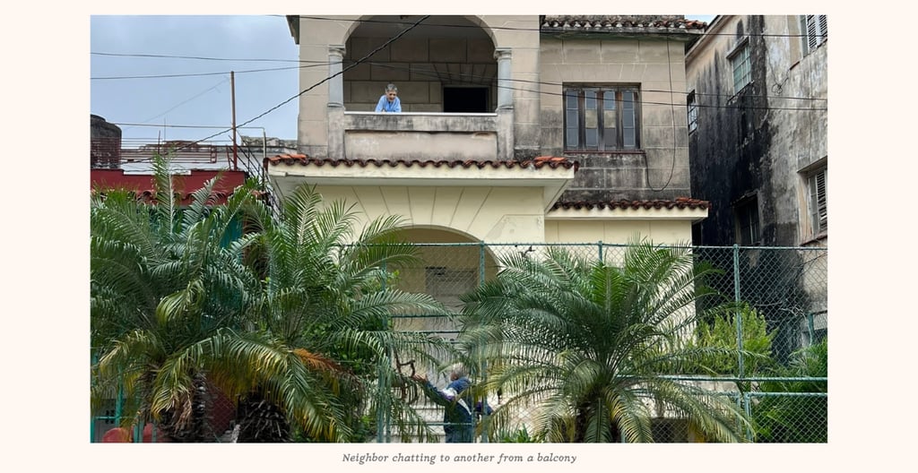 Neighbors talking from a balcony in Havana Cuba 