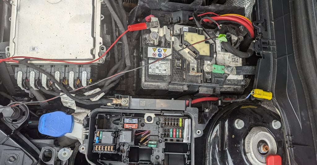 a car engine with a lot of wires and wires