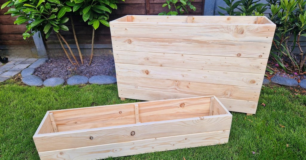 quality planters and plant boxes made from solid wood handmade in uk large and tall wooden troughs