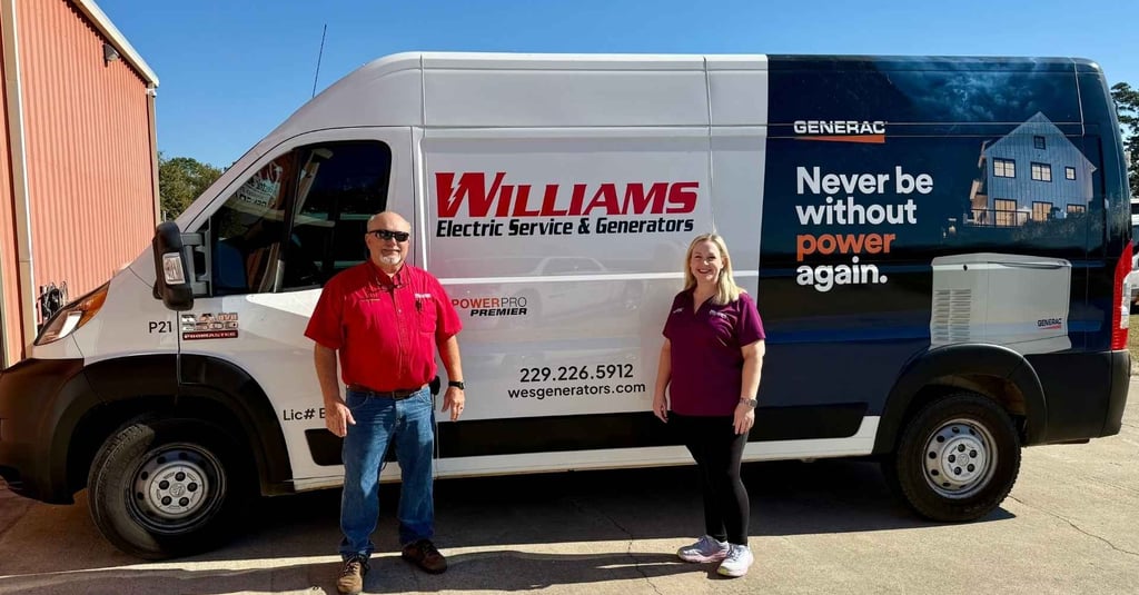 Father Bret and Daughter Whitney standing in front of there Williams service van