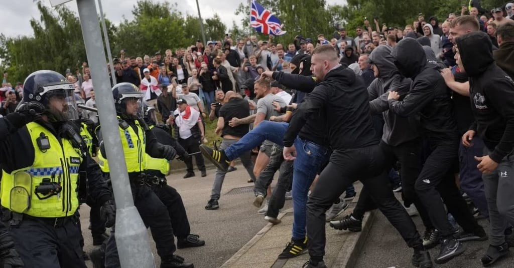 Anti-immigration protestors clash with police in South Yorkshire, UK