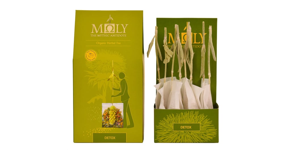a box of tea bags with a picture of a woman in a dress