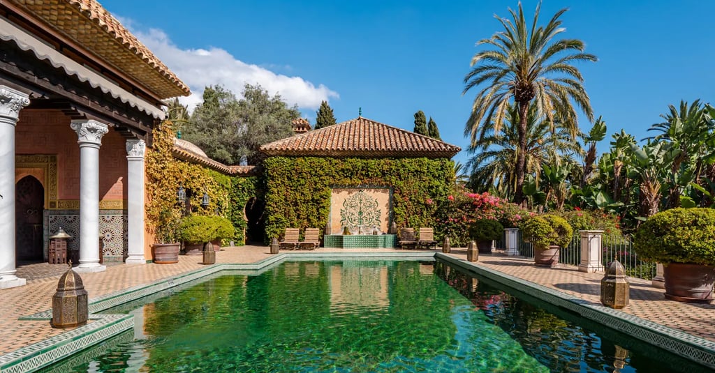 Moorish-style pool courtyard with green tiled swimming pool