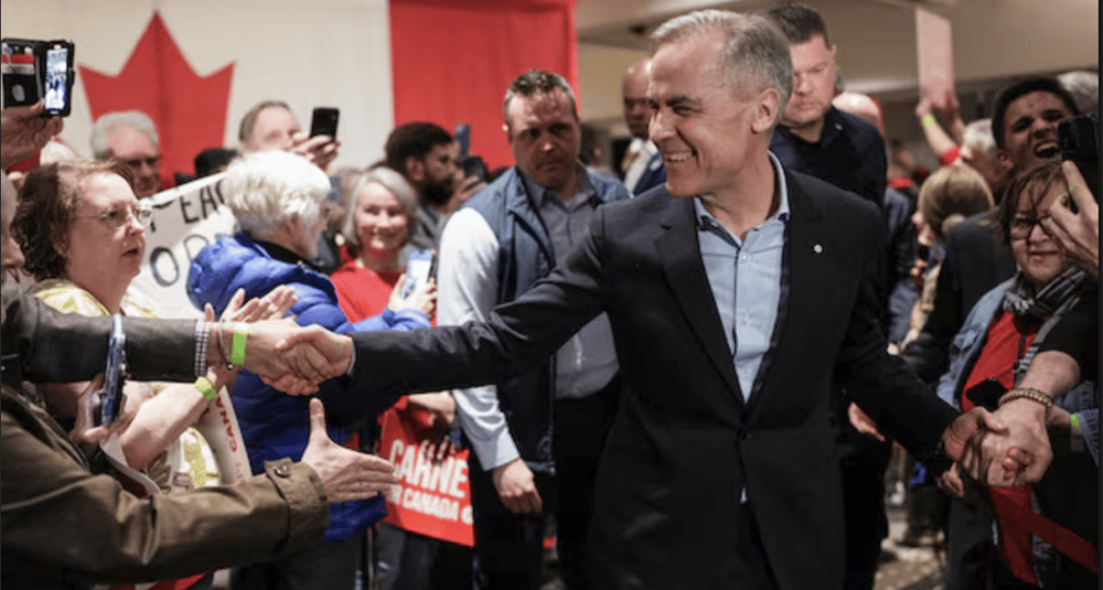 a man in a suit and tie is shaking hands with a woman
