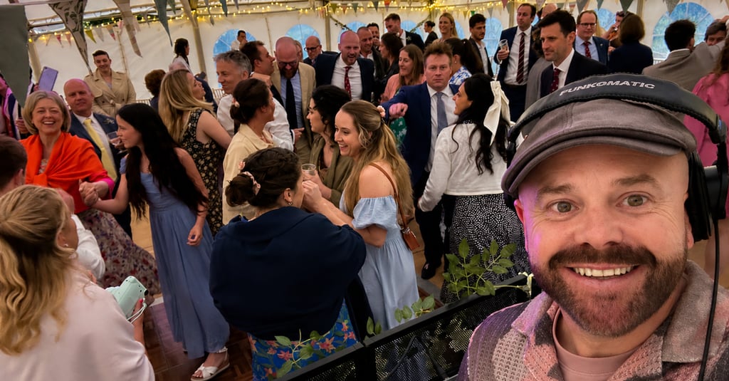 Marquee Wedding DJ and dancing crowd - Warwickshire
