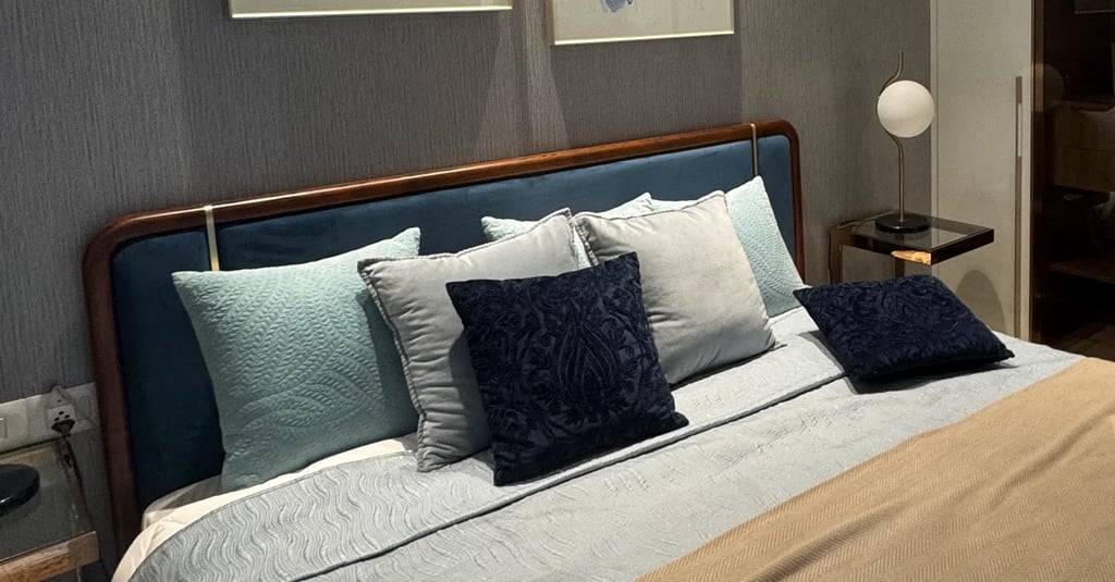 A clean bedroom with mattress and pillows