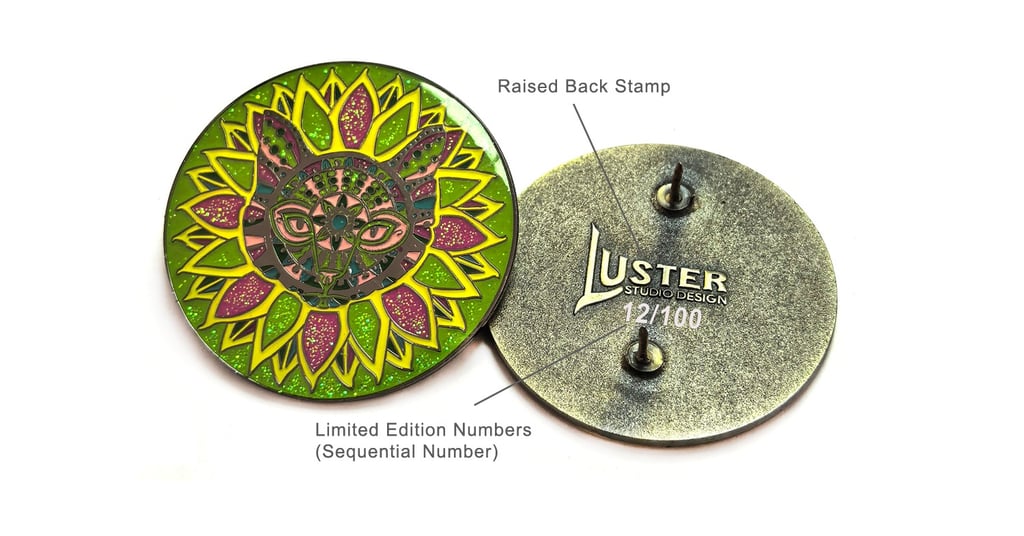Enamel pins showing back stamp and sequential numbering