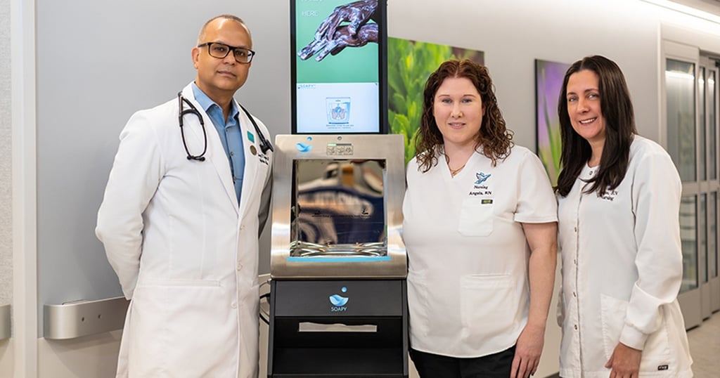 a group of doctors and nurses in white coats and lab coats