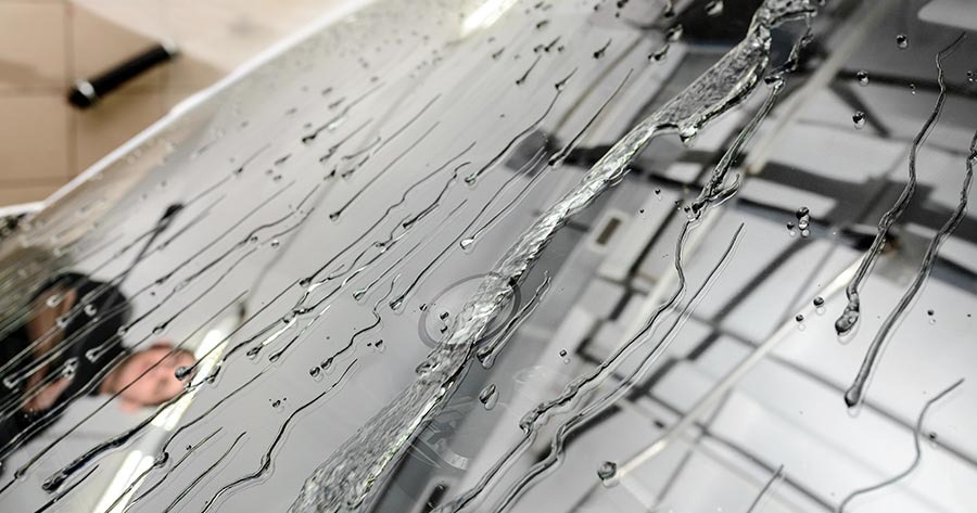 Coated windshield with Ceramic Rain Repellant 