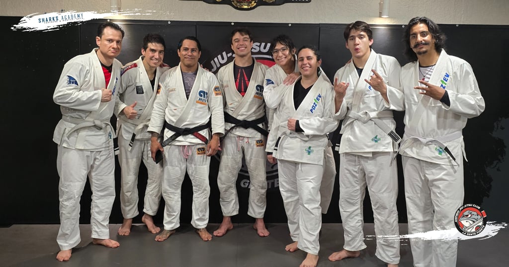 equipo de jiujitsu de sharks academy después de la graduación de jiujitsu
