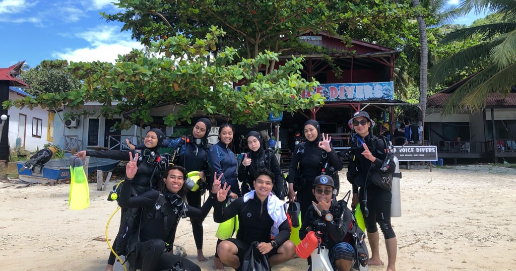 a group of people standing in front of a building