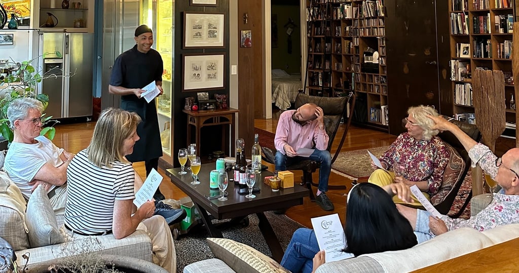 a group of people sitting around a table