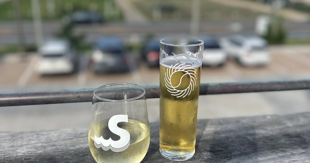 glasses of beer on a ledge swellsa brewing