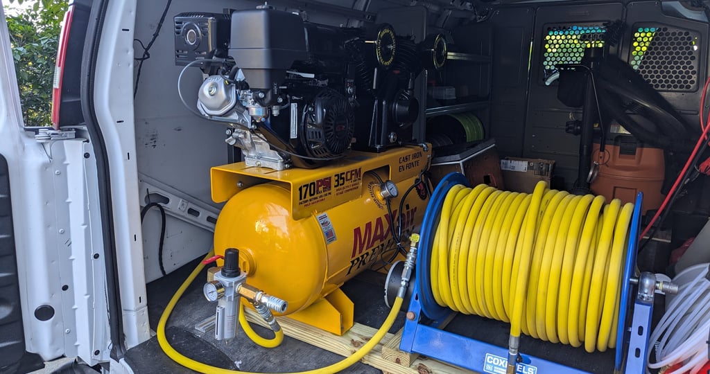 Air compressor dryer vent cleaning