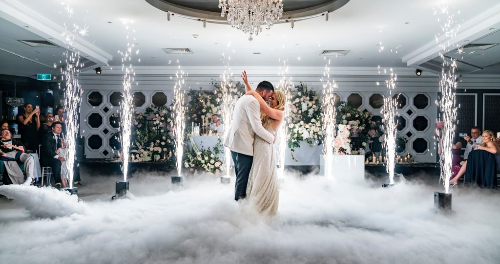 dj ps at wedding first dance with dry ice and sparklers 