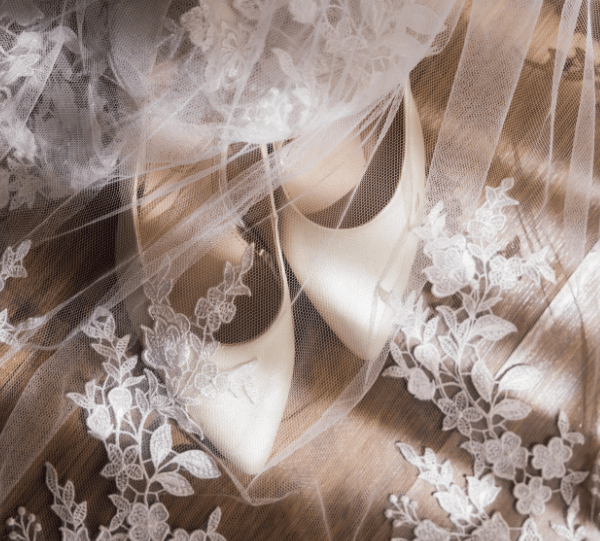 white color heels covers with vail
