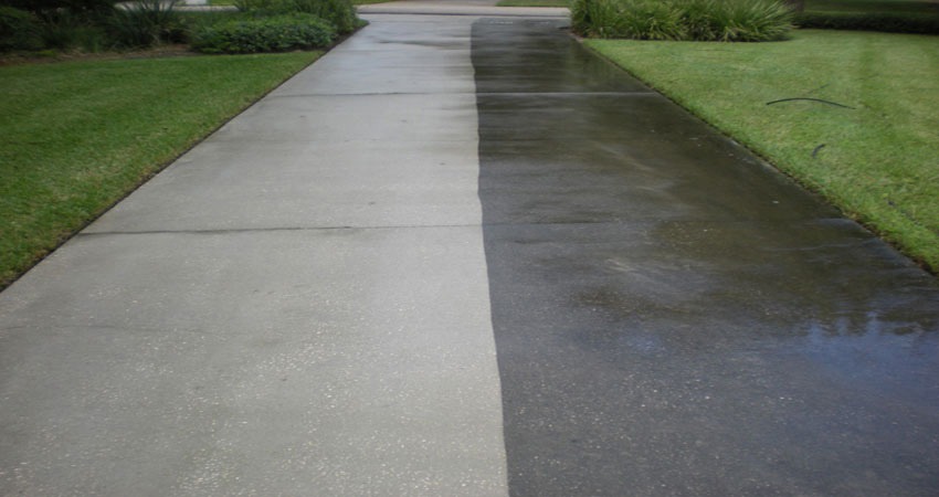 A driveway cleaned 50/50 to show the difference