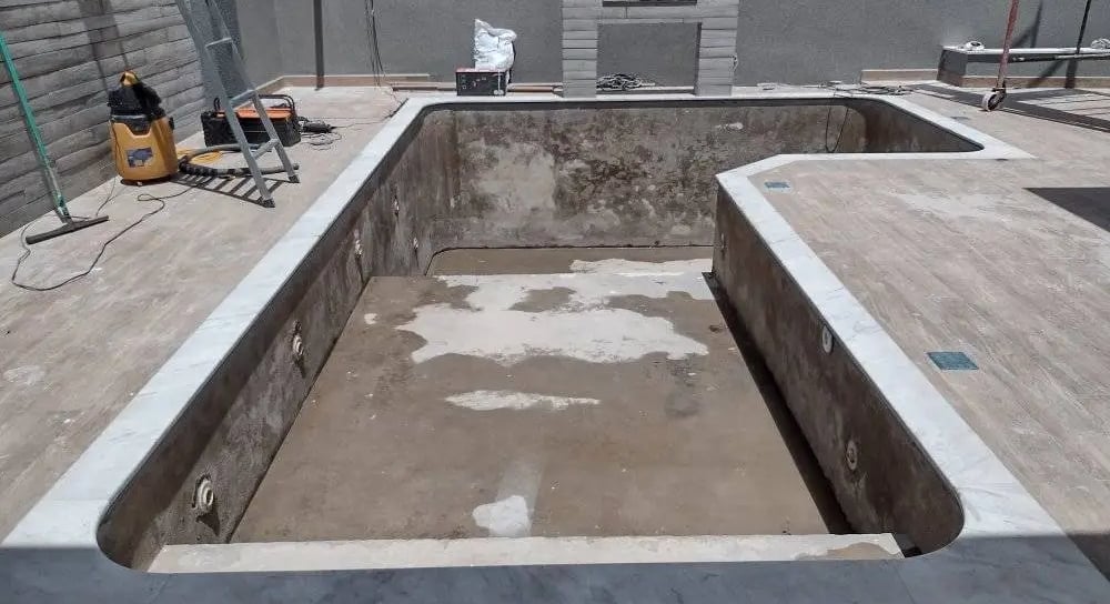 pemasangan batu alam kolam renanang