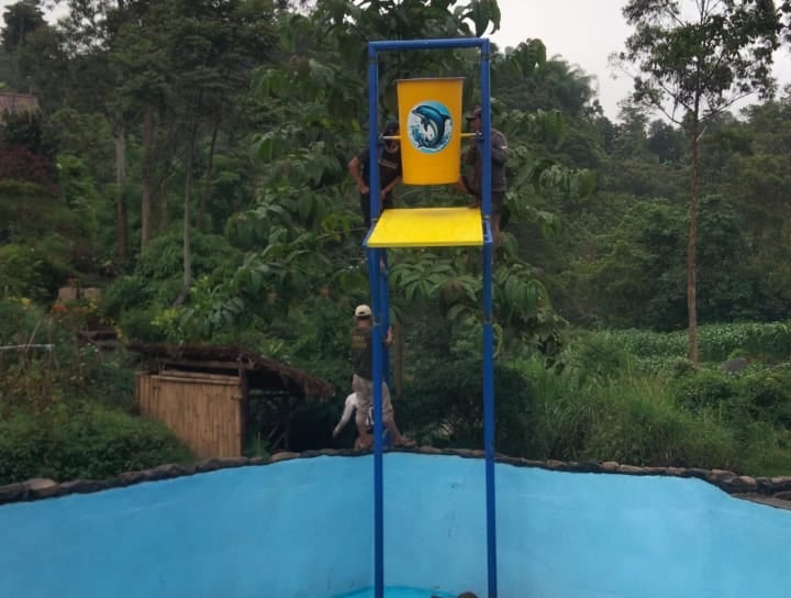 renovasi kolam renang alam dan penambahan wahana bermain
