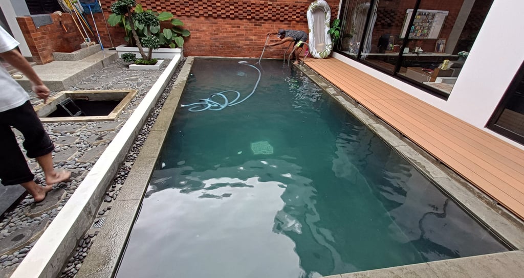 pemakuman kolam renang dengan finishing kolam renang batu alam andesit
