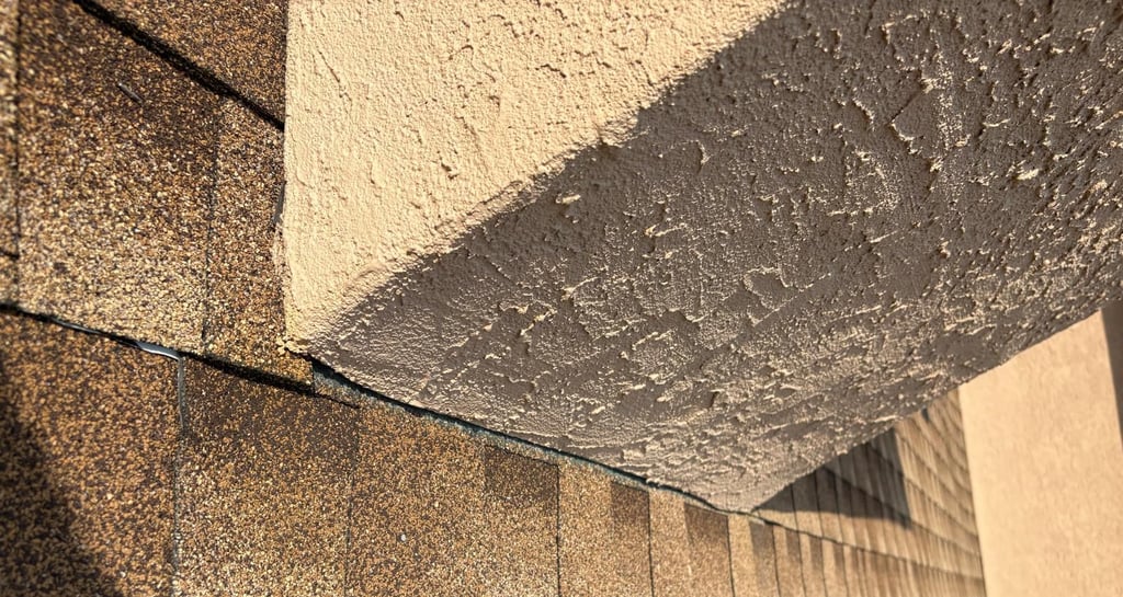 Damaged chimney flashing on an asphalt shingle roof, showing a common cause of water leaks, before repair by Roslyn Chimney