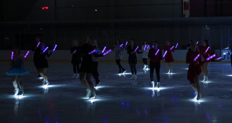 Adult figure skaters dancing flashmob