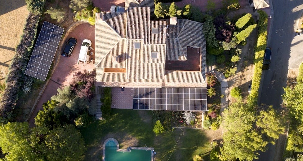 a house with solar panels installed on a roof