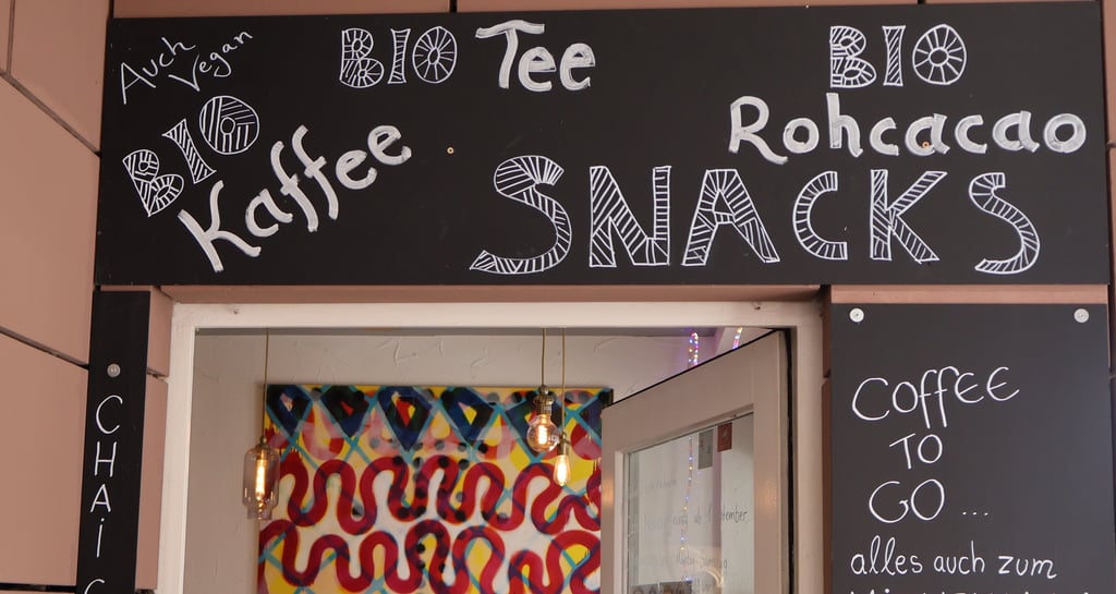 a sign that says coffee shop