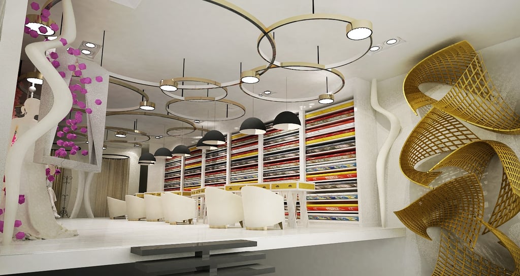Bold creative showroom — white sculptural walls, colourful rainbow shelf display, artistic golden sc