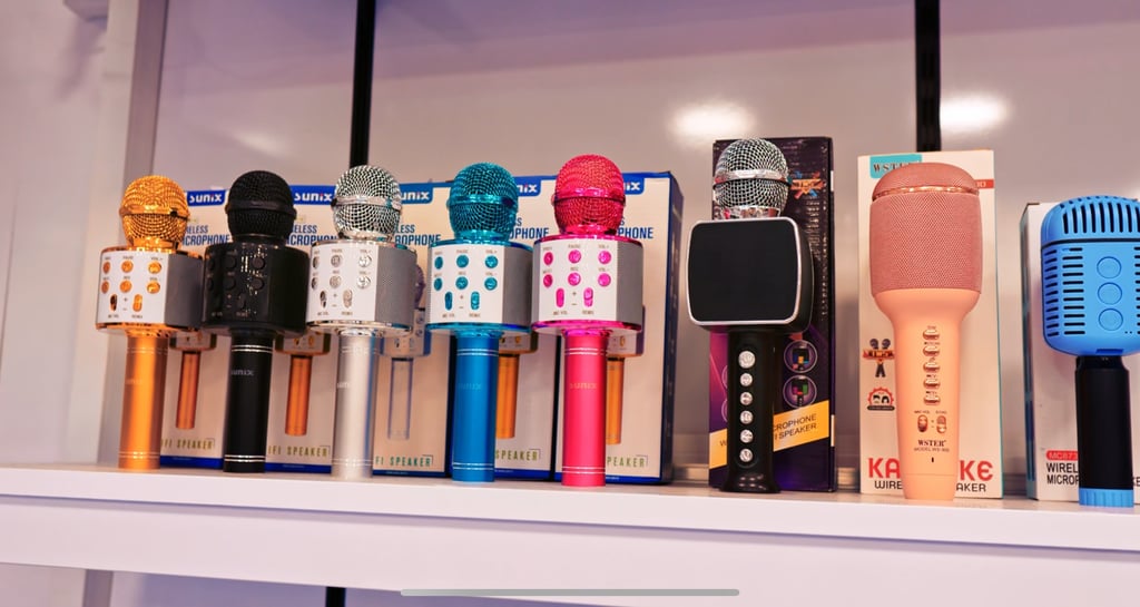 a shelf of microphones and microphones on a shelf