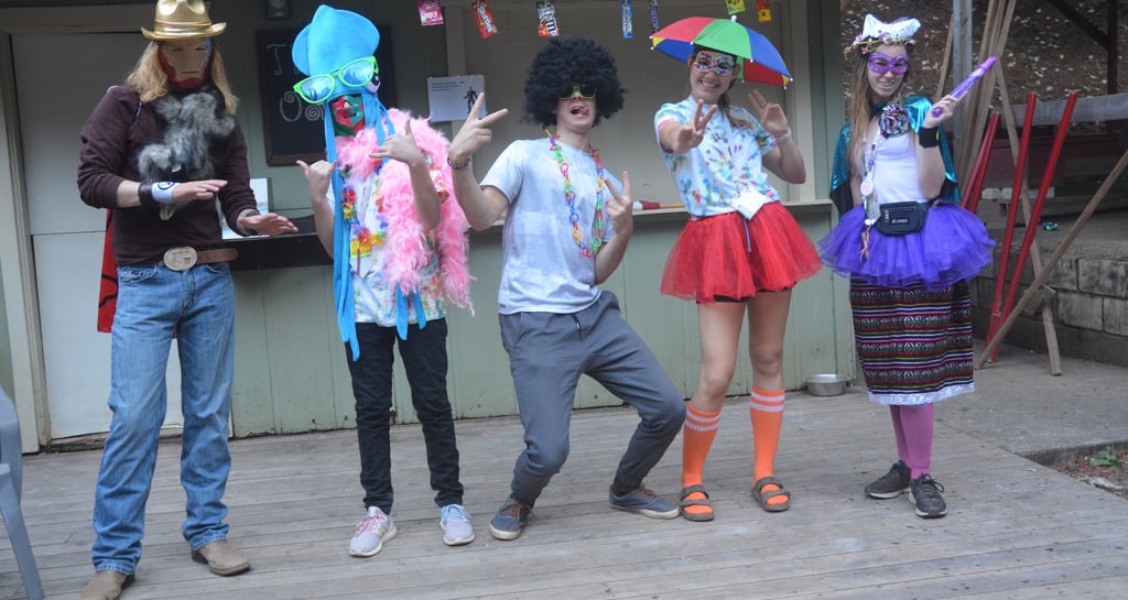 a group of people leaders in costumes for a dinner