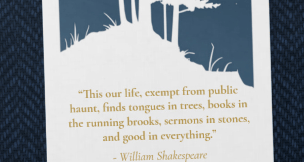 Close up of the forest themed binder detailing the Shakespeare nature quote.