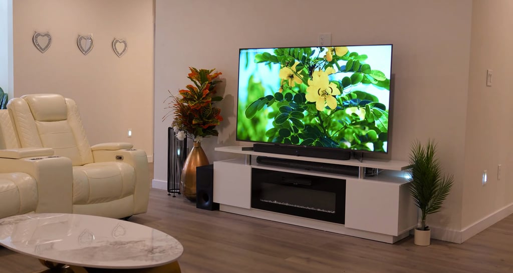 Cozy living room in adult family home with comfortable sofas, chairs, and a warm, home-like atmosphere for residents.