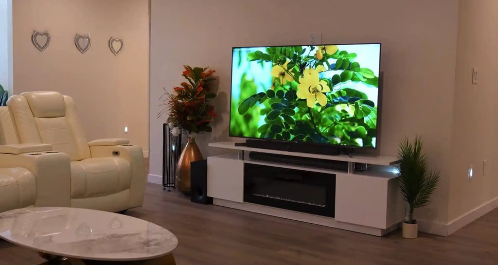 Cozy living room in adult family home with comfortable sofas, chairs, and a warm, home-like atmosphere for residents.