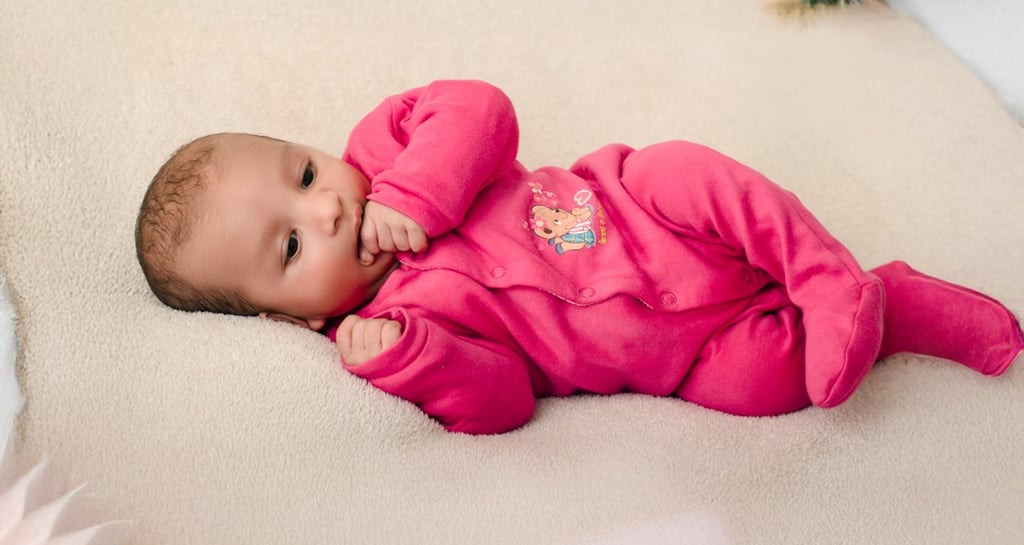 Wonderpose Photography. Newborn Photography. Pink dress