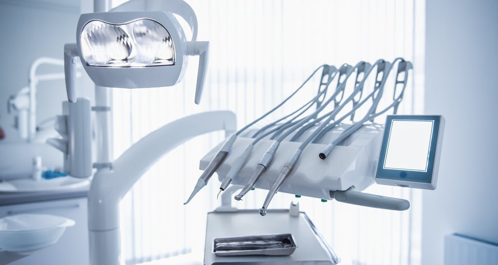 a dental room with a dental chair