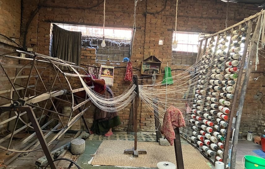 making the TANA or the wrap. then after setting it on the loom, we the weaving of the BANA or weft