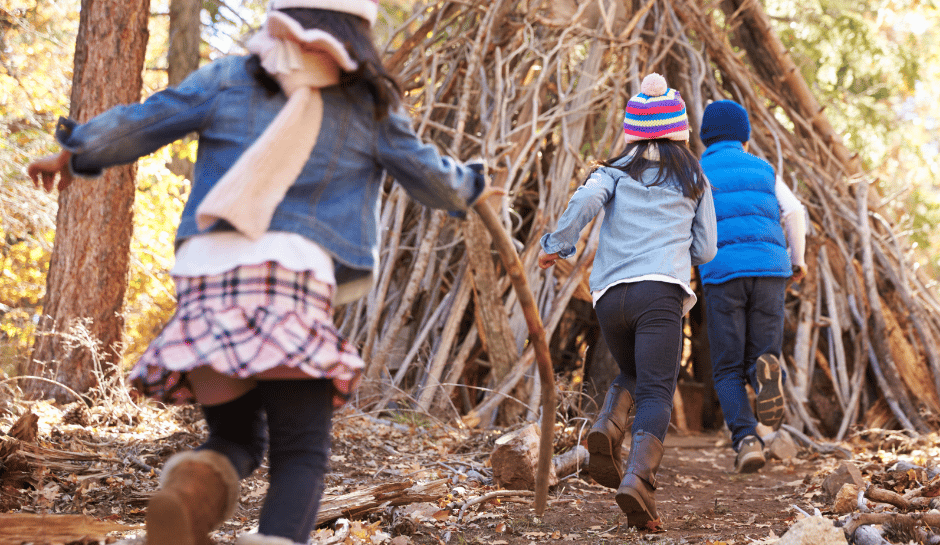 children playing in the woods