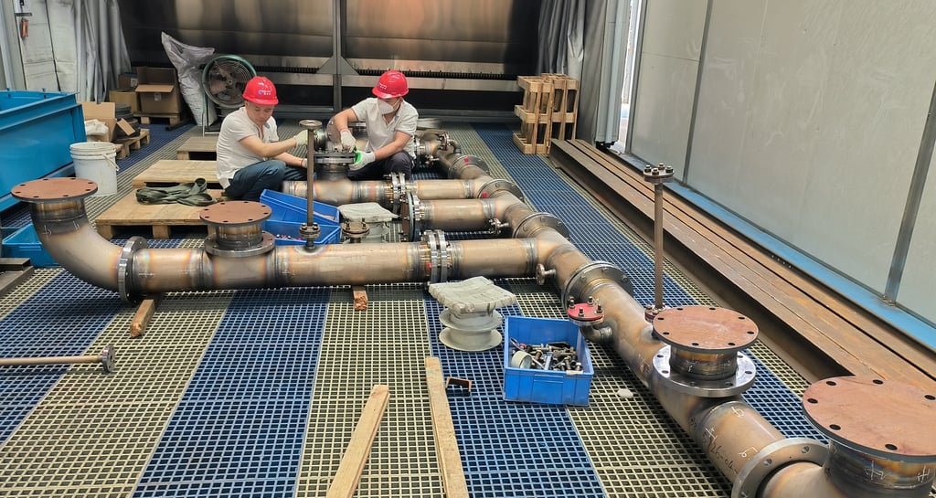 PMI Piping workers are assembling pipes 