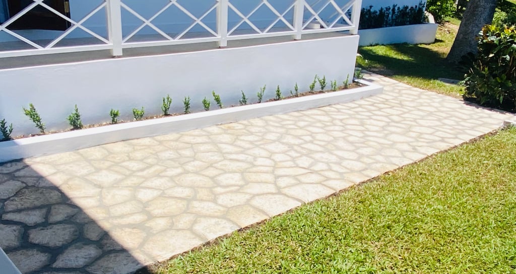 Back yard upgrade with Jamaican cut stone walkway.