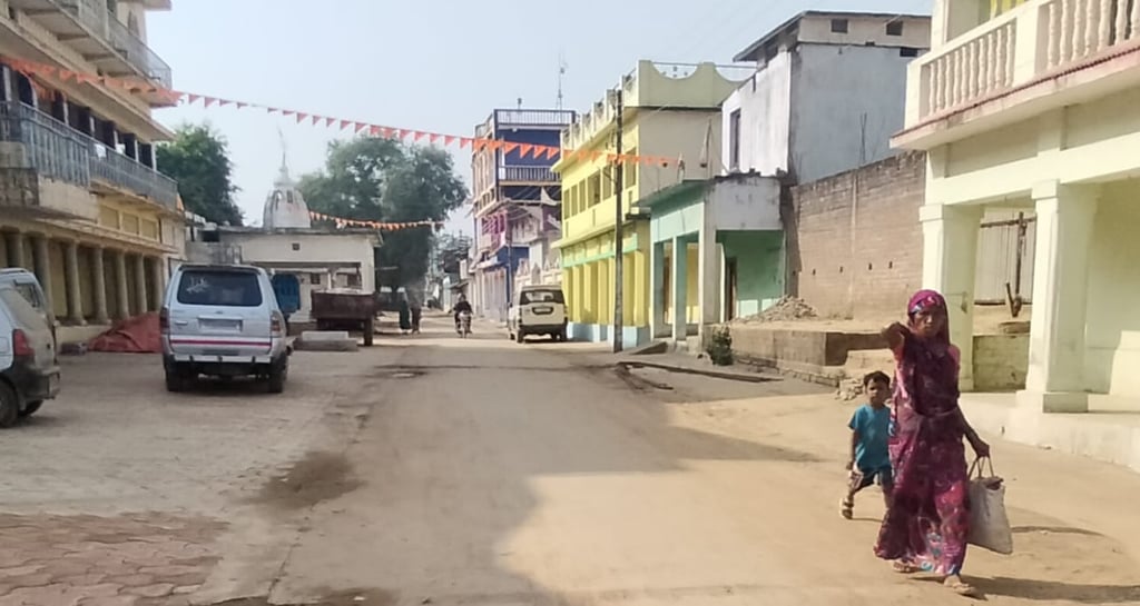 image of vehicals and lady with child