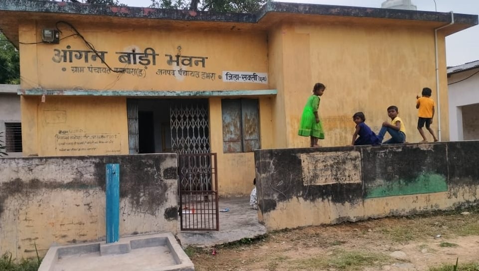 some children pare playing on the wall