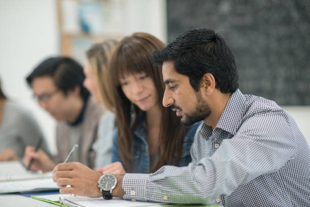 Students filling visa application forms study abroad