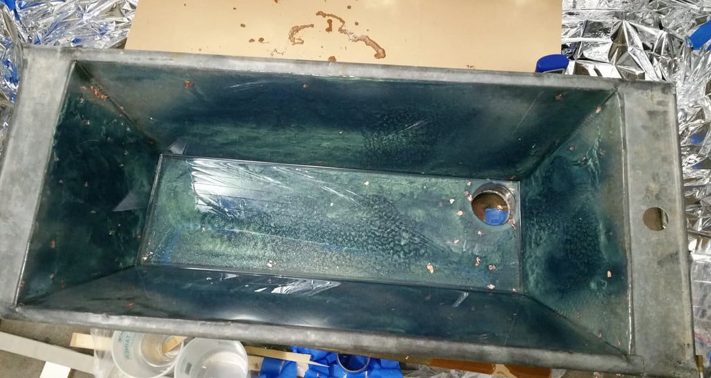 French bath in sea green epoxy, converted to kitchen sink.  Holes cut for faucet and drain. Colorado Springs.